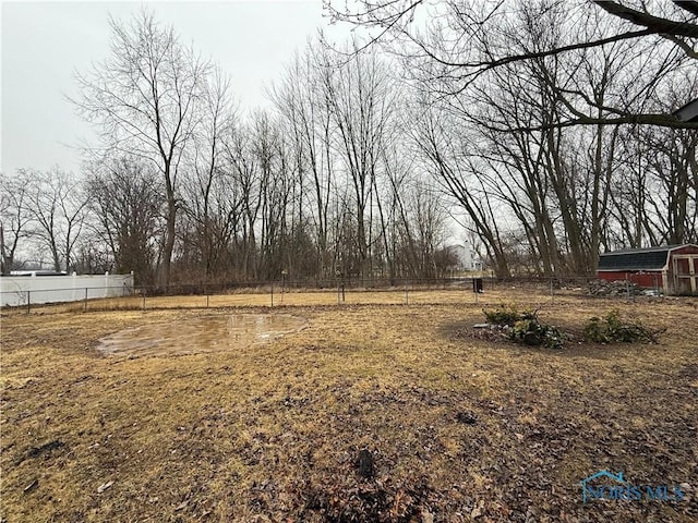 view of yard featuring fence