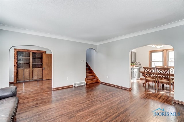 living room featuring visible vents, dark wood finished floors, stairway, and baseboards