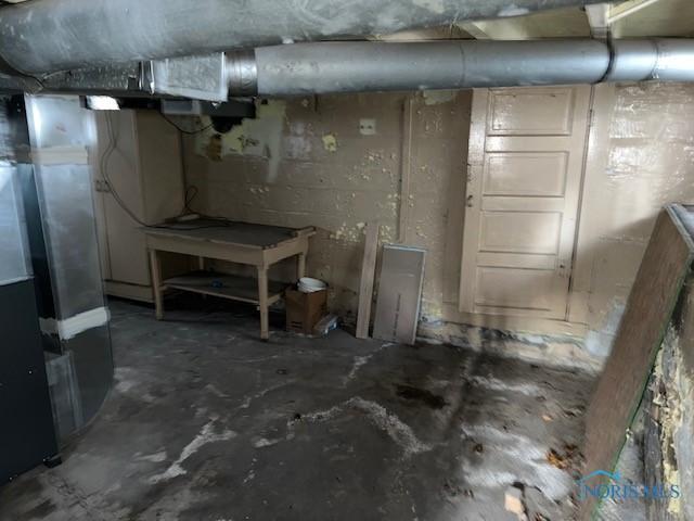 unfinished below grade area with heating unit