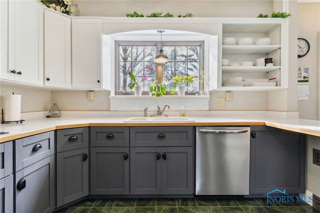 kitchen with dishwasher, light countertops, gray cabinetry, white cabinetry, and a sink