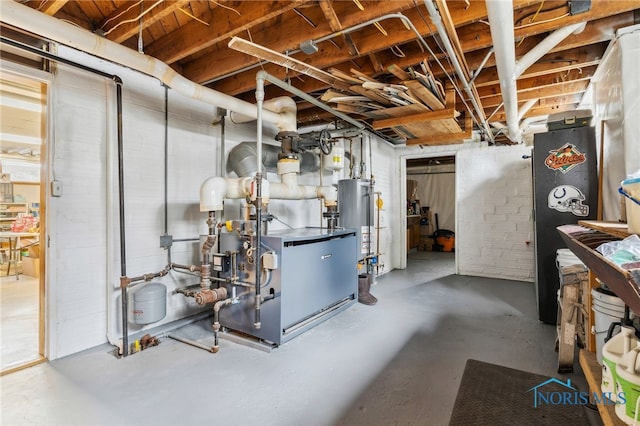 unfinished basement featuring gas water heater and a heating unit