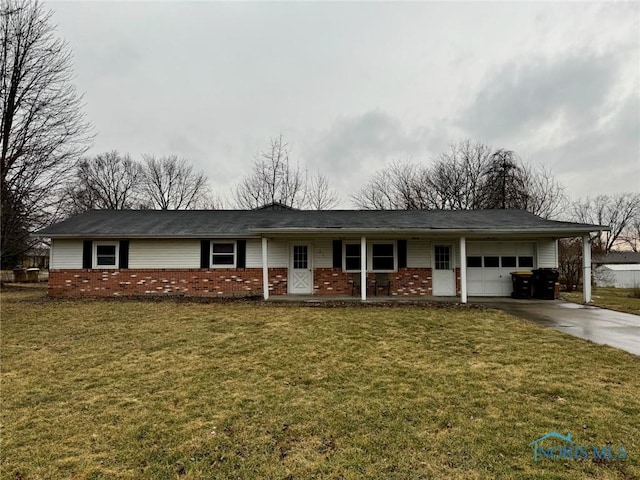 ranch-style house with concrete driveway, brick siding, an attached garage, and a front lawn