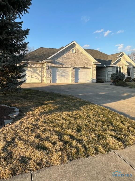 single story home with an attached garage