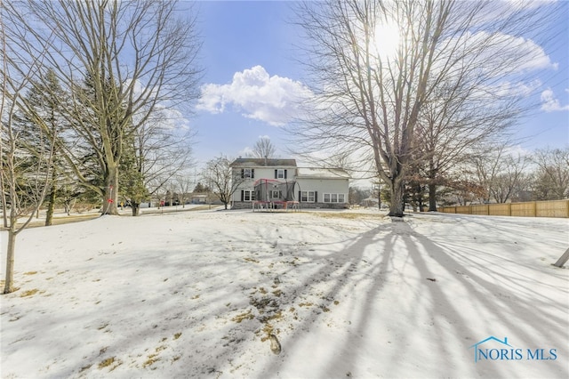 view of front of house with fence