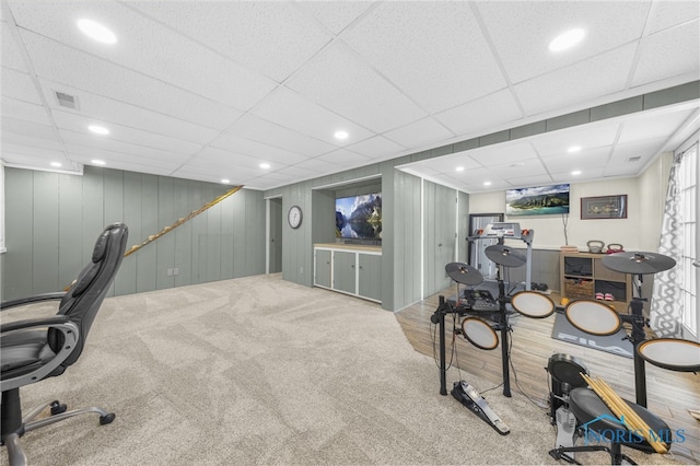 carpeted office featuring visible vents, a drop ceiling, and recessed lighting