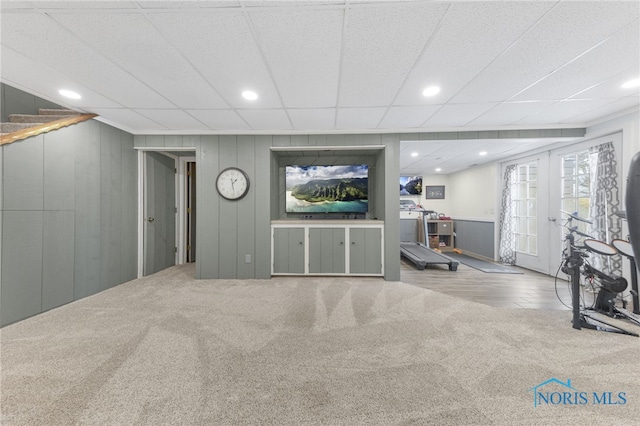 living area with recessed lighting, french doors, and carpet flooring