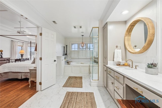 bathroom with marble finish floor, a shower stall, and visible vents