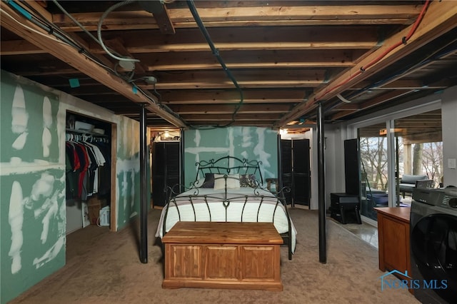 bedroom featuring washer / clothes dryer