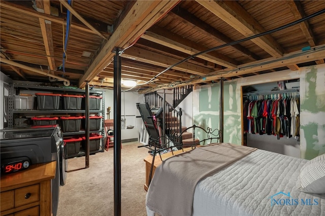 carpeted bedroom with a closet