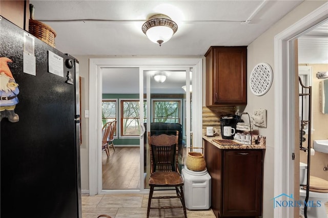 interior space with freestanding refrigerator