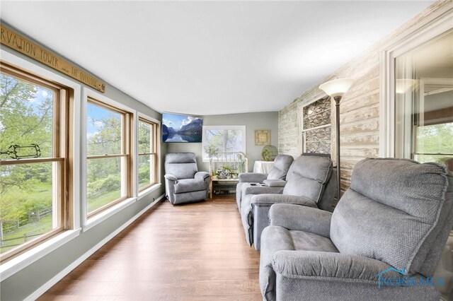 6011 N River Rd, Waterville, OH 43566 - living room with healthy amount of natural light, wood finished floors, and baseboards