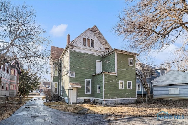 2618 Collingwood Blvd, Toledo, OH 43610 - view of side of property with a chimney