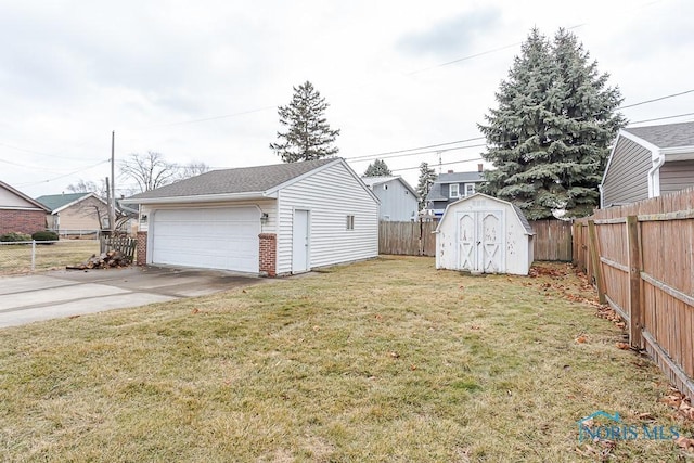 detached garage featuring fence