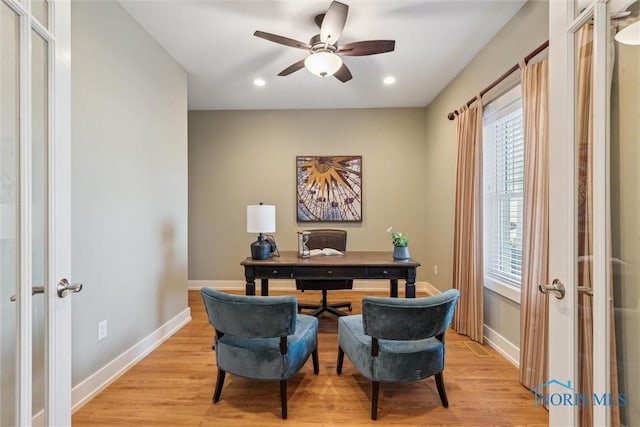 office with light wood finished floors, recessed lighting, a ceiling fan, and baseboards