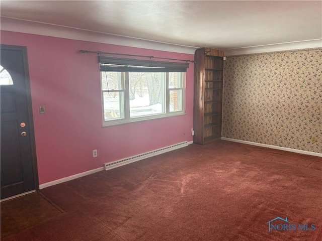 foyer entrance with carpet, baseboards, and baseboard heating