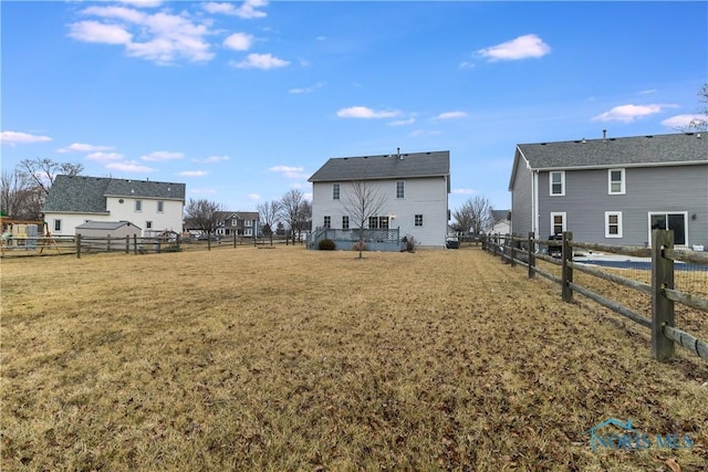 view of yard with fence