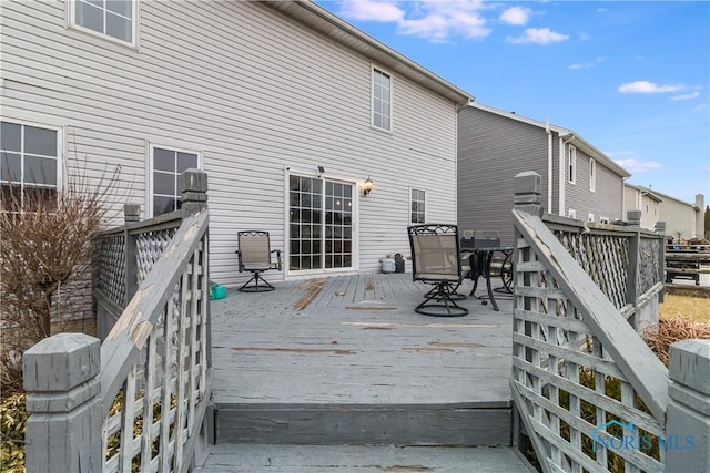 deck with outdoor dining space
