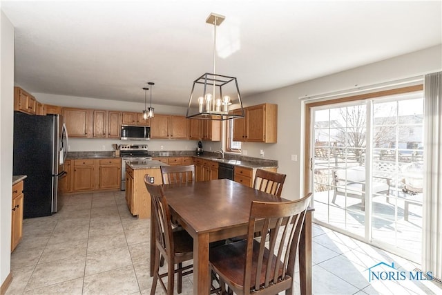 dining room featuring light tile patterned floors