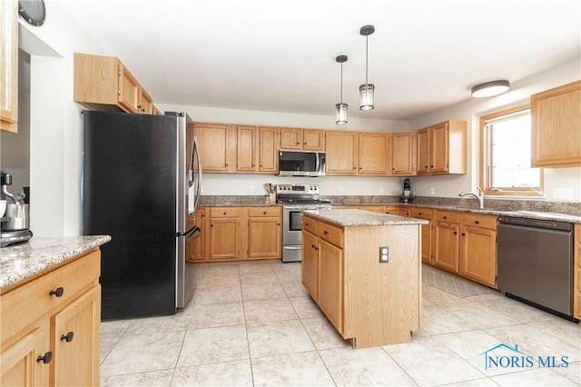 kitchen with light stone counters, a kitchen island, stainless steel appliances, light tile patterned flooring, and hanging light fixtures