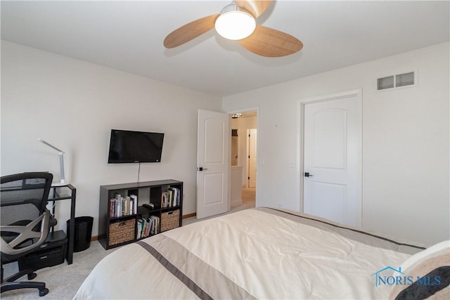 bedroom featuring visible vents, ceiling fan, baseboards, and carpet