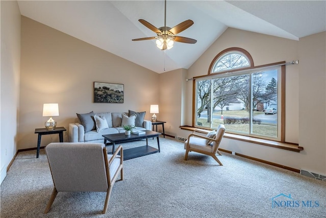 living area featuring light carpet, visible vents, and baseboards