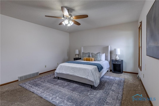 carpeted bedroom with visible vents, ceiling fan, and baseboards