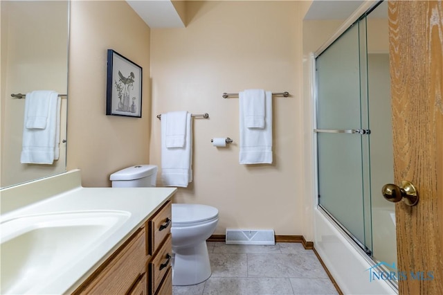 full bath featuring visible vents, toilet, vanity, tile patterned flooring, and baseboards