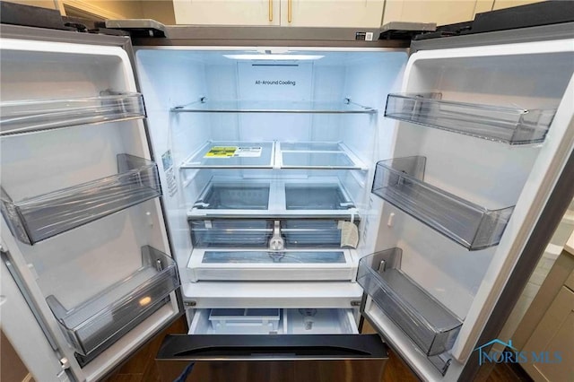 interior details featuring fridge