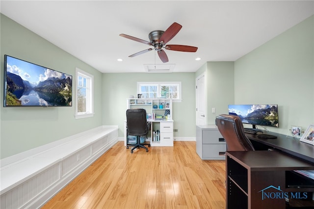 office area featuring recessed lighting, plenty of natural light, light wood-style flooring, and baseboards