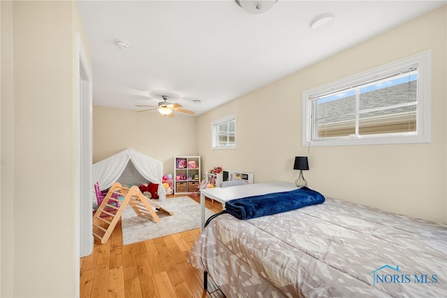 bedroom with light wood-type flooring