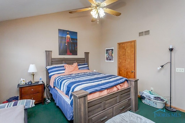 bedroom with lofted ceiling, carpet, visible vents, and a ceiling fan