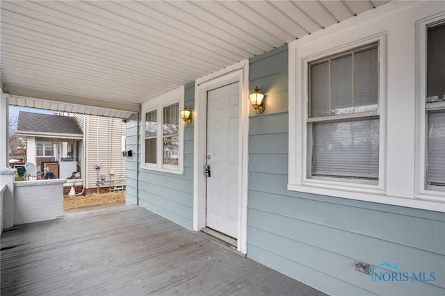 wooden terrace with covered porch