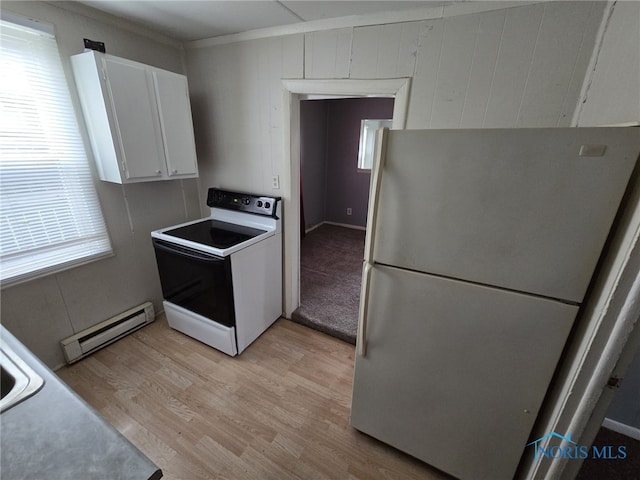 kitchen featuring freestanding refrigerator, electric range, light wood-type flooring, white cabinets, and a baseboard heating unit