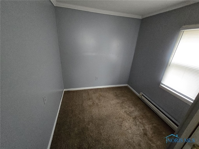empty room with a baseboard radiator, baseboards, ornamental molding, and carpet floors