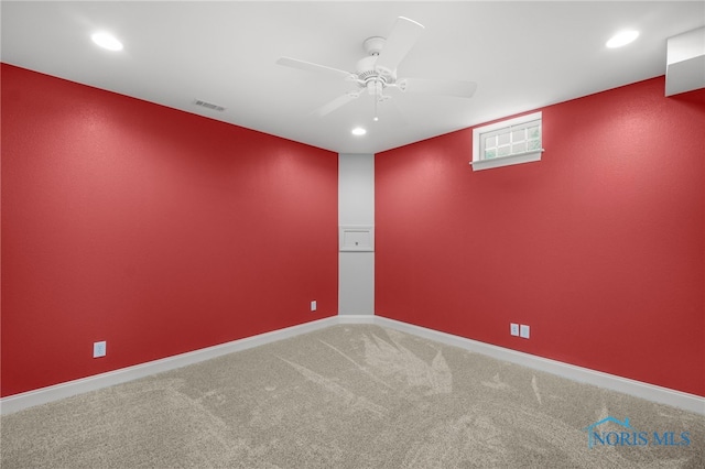 carpeted spare room with baseboards, visible vents, a ceiling fan, and recessed lighting