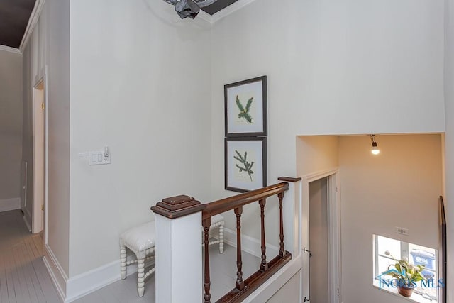 interior space with wood finished floors and baseboards