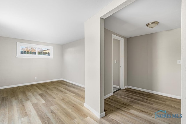 5728 Rudyard Rd, Sylvania, OH 43560 - basement featuring baseboards and wood finished floors