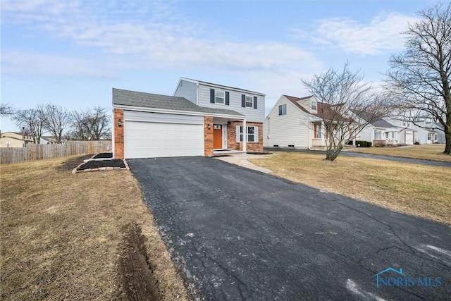 view of front facade featuring aphalt driveway, brick siding, an attached garage, fence, and a front lawn