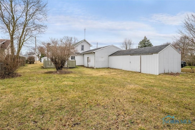 view of yard featuring an outbuilding and a pole building