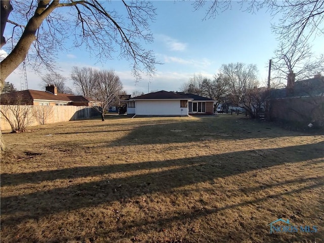 view of yard featuring fence