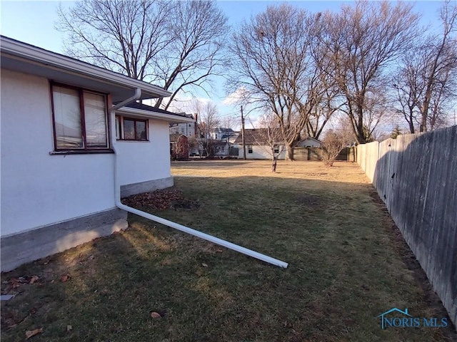 view of yard featuring a fenced backyard