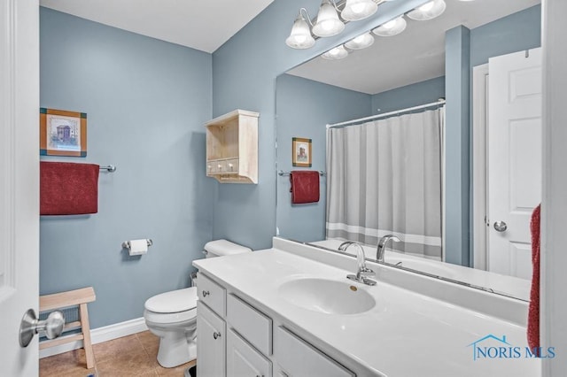 full bathroom with toilet, a shower with shower curtain, vanity, baseboards, and tile patterned floors