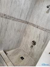 interior details with tiled shower