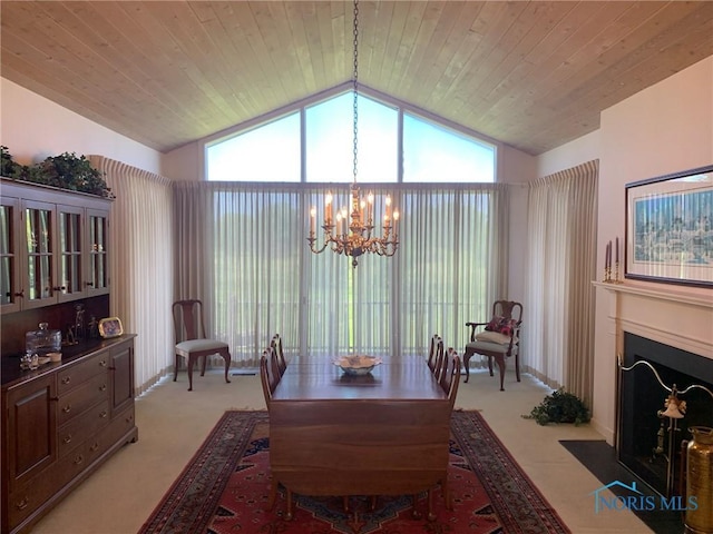 dining area featuring light carpet, wood ceiling, a fireplace with flush hearth, vaulted ceiling, and a notable chandelier