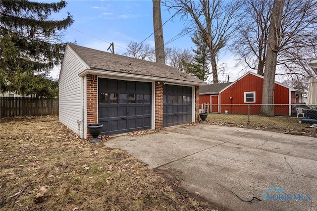 detached garage with fence