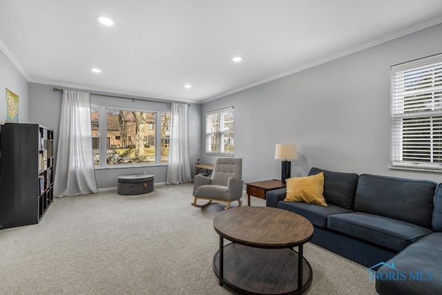 living room featuring baseboards, ornamental molding, carpet flooring, and recessed lighting