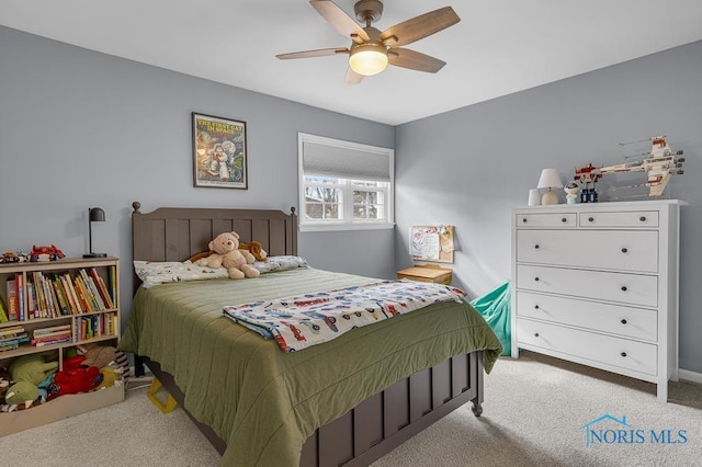 bedroom with carpet floors and a ceiling fan