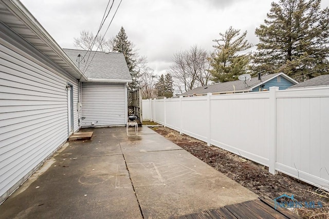 view of patio with fence