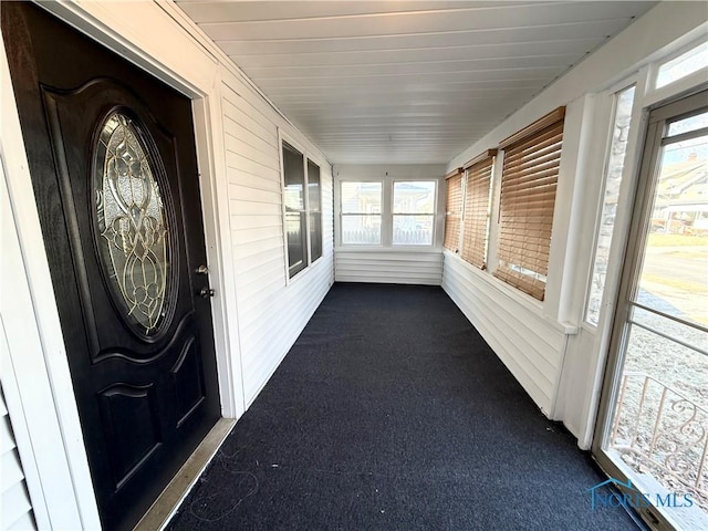 view of unfurnished sunroom