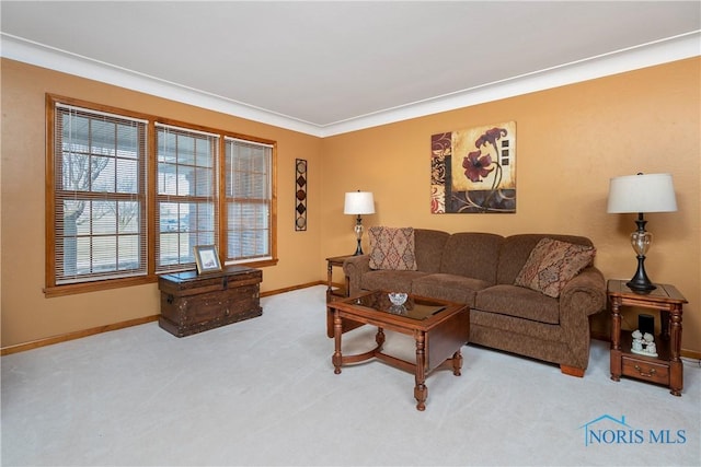 living room featuring carpet and baseboards